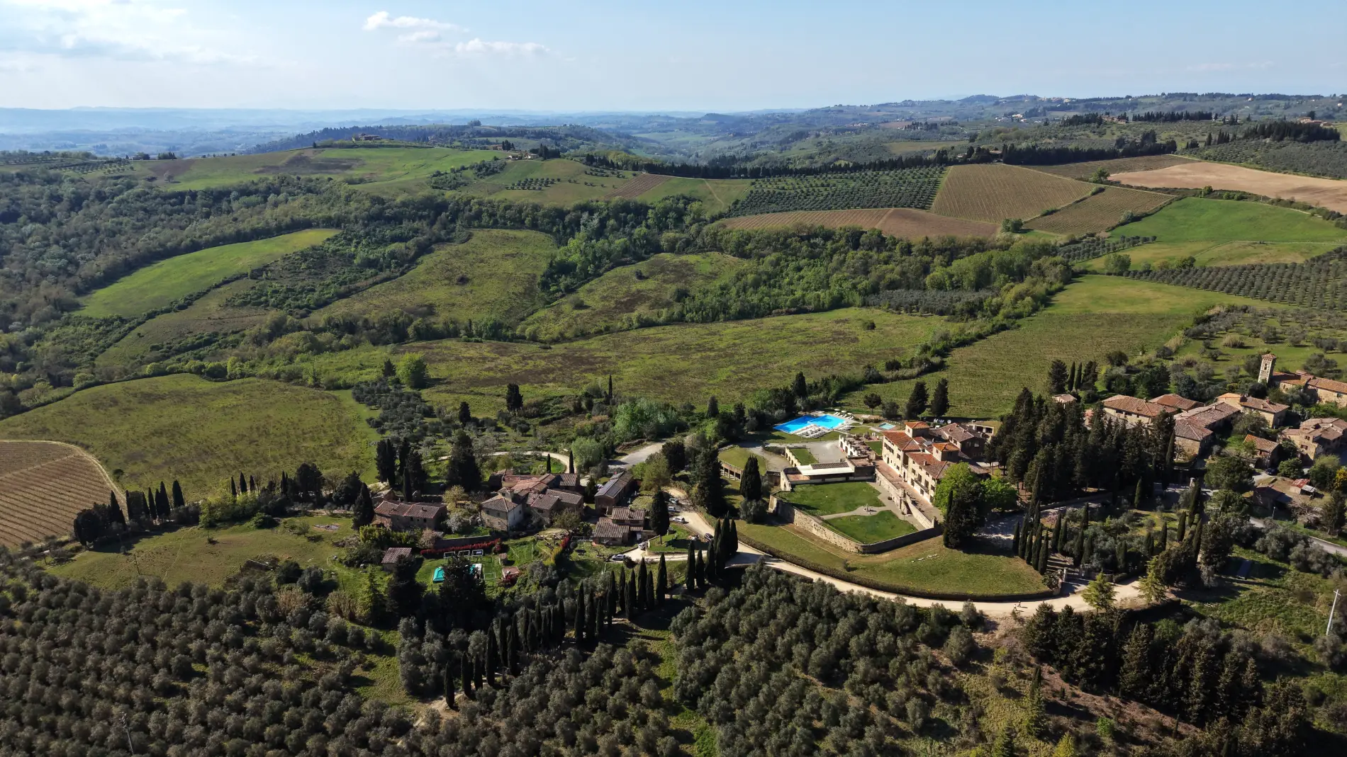 Aerial panorama of the villa and rolling Chianti hills surrounding Villa San Filippo in Tuscany - Villa San Filippo, BZAR hotels in Tuscany