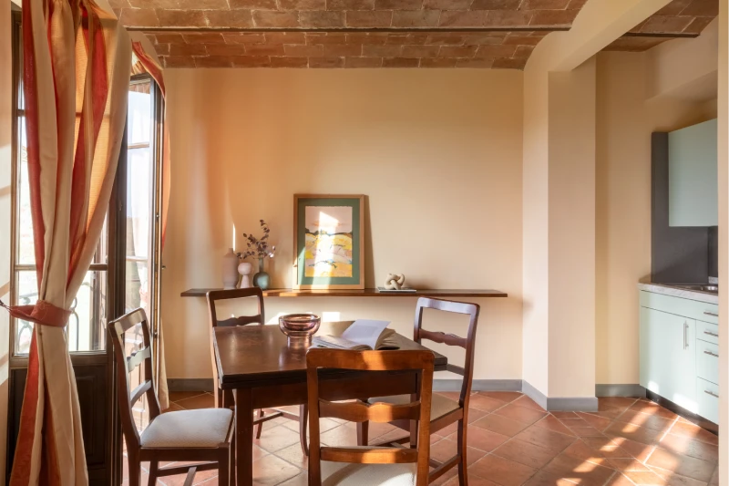 Suite with dining area, kitchenette and elegant furnishings in bright setting at Barberino Tavarnelle, Tuscany - Villa San Filippo, BZAR hotels in Tuscany